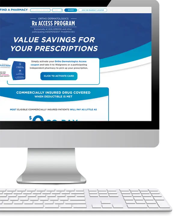 Hal and Taz jumping on keyboard in front of computer monitor displaying the OrthoRxAccess website